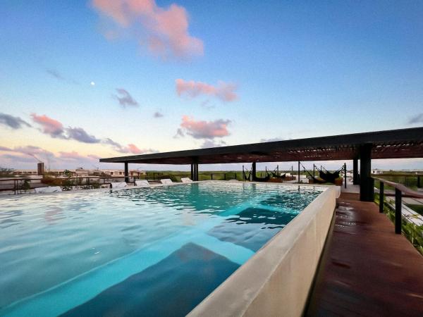 Na zdjęciu widoczny jest obiekt Gated 2BR apartment with rooftop pool położony w mieście Tulum.