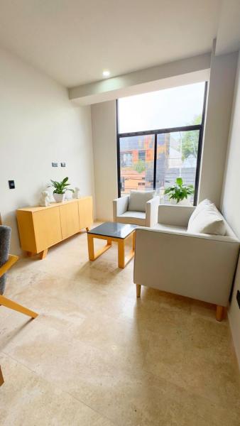照片显示了位于Momoxpan市的Smart Living Cielo物件。
