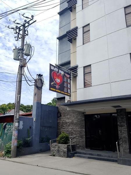 The photo shows the WJV Mia Hotel Humay-Humay located in the city of Pajo.