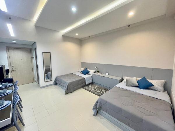 A la foto es mostra l'objecte Modern Family Studio at SMDC Cheer Residences situat a la ciutat de Marilao.