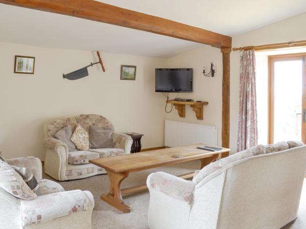A la foto es mostra l'objecte Orchard View Barn situat a la ciutat de Broadhembury.