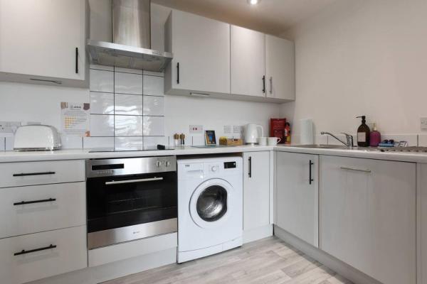 A la foto es mostra l'objecte Spacious 2 Bedroom Flat with Parking situat a la ciutat de Cosham.