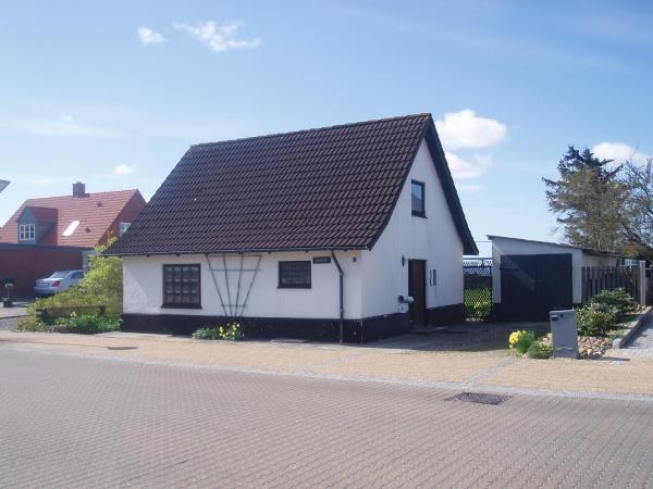 Na fotografii je vidět objekt Strandhuset Holiday Home nacházející se ve městě Fårup.