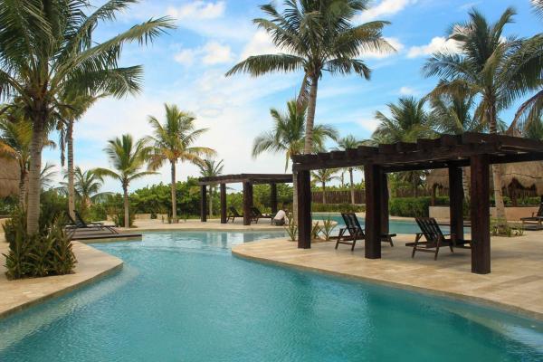 Na foto é possível ver o objeto Eubea Luxury beachfront penthouse localizado na cidade de Uaymitun.