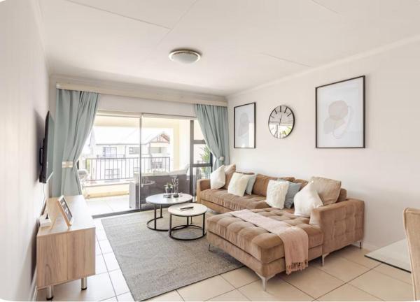 The photo shows the Modern Apartment near OR Tambo Airport located in the city of Edendale.