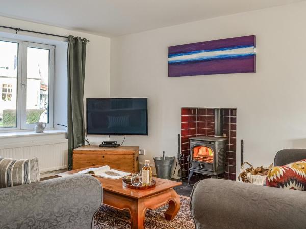 A la foto es mostra l'objecte The Cottage situat a la ciutat de Leitholm.