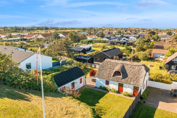 A la foto es mostra l'objecte Møllehusets Backyard House & Annex situat a la ciutat de Blokhus.