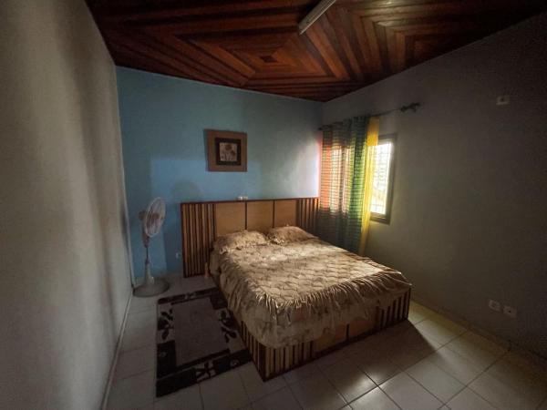 The photo shows the warm furnished accommodation near stadium located in the city of Yapoma.