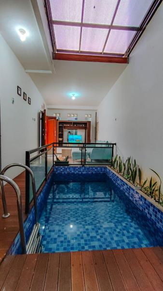 A la foto es mostra l'objecte Villa Keluarga Royal Arois Unit E-17 situat a la ciutat de Tlekung.