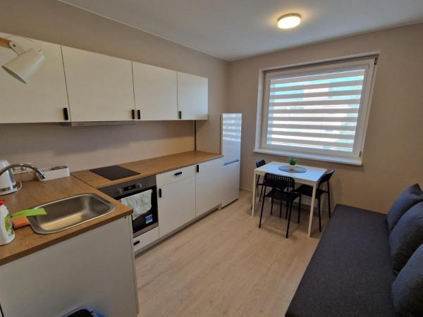 Na zdjęciu widoczny jest obiekt FB Apartaments położony w mieście Milašaičiai.