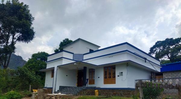 Na zdjęciu widoczny jest obiekt Munnar Wood valley położony w mieście Munnar.
