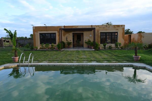 The photo shows the Mura Yoga Villa located in the city of Nauratori.