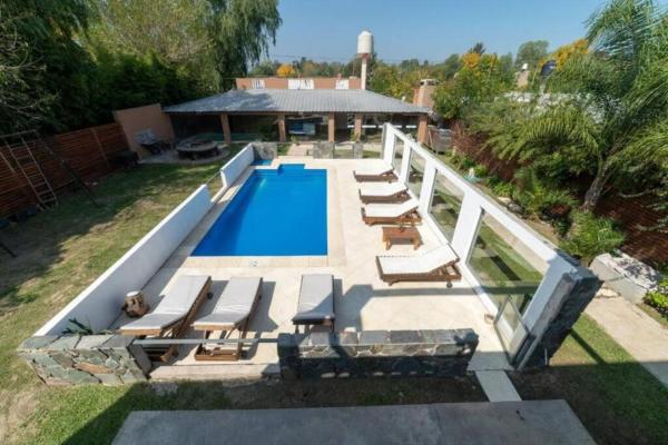En la foto se muestra el objeto Buenos Aires de Ezeiza Duplex- Piscinas- Playroom- Sauna ubicado en la ciudad de La Unión.