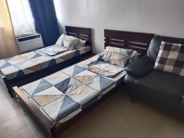 A la foto es mostra l'objecte Family Staycation 2 with Pool situat a la ciutat de Manila.