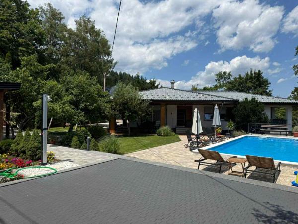 The photo shows the Villa Wood & Green SPA located in the city of Hadžići.
