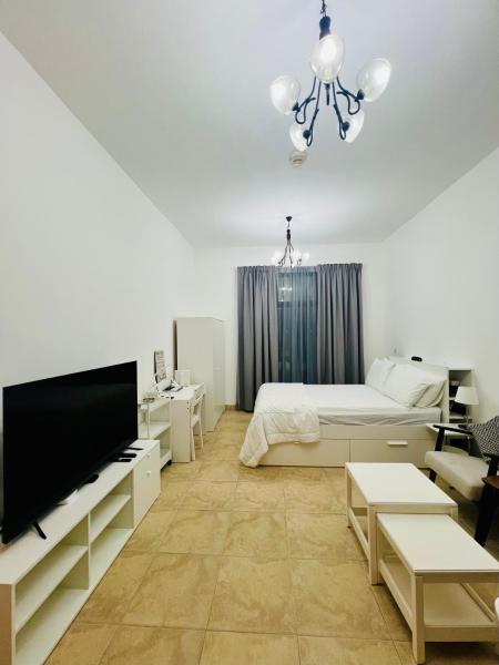 A la foto es mostra l'objecte A Studio Apartment with All Essential Amenities situat a la ciutat de Dubai.