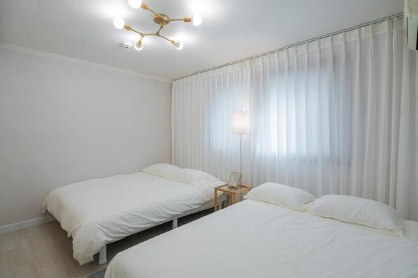 Op de foto is het object Cozy Haven te zien, gelegen in de stad Suwŏn-yŏk.