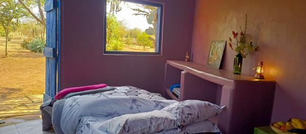 På bilden syns objektet Bushfit -Near Amboseli - Room for 1 with breakfast, dinner, workout som ligger i staden Oloitokitok .