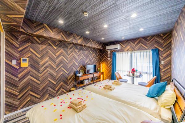 Kuvassa näkyy kohde オーシャンビュー窓から見える景色を思い出に The琉球タワー 10D, joka sijaitsee kaupungissa Yonabaru.