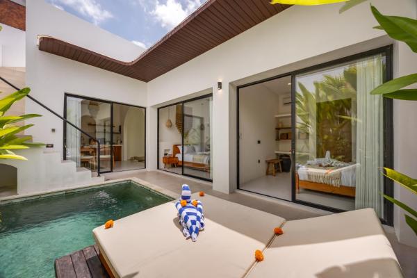 A la foto es mostra l'objecte CosyCalm 2bd Villa wRooftop 4 mins Cemagi Beach situat a la ciutat de Cemagi.