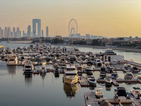 A la foto es mostra l'objecte Amazing Views of Palm & Dubai Eye Stylish Studio situat a la ciutat de Dubai.