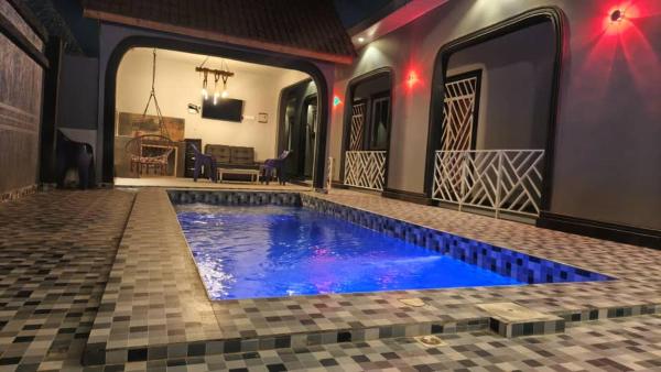 The photo shows the Heavenly ApHEARTment With a Swimming Pool located in the city of Kikuyu.