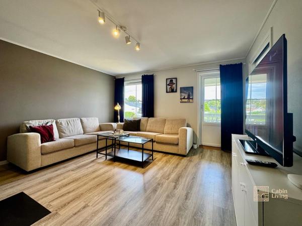Na foto é possível ver o objeto Seaside apartment 2 balconies & sea view Grimstad localizado na cidade de Grimstad.