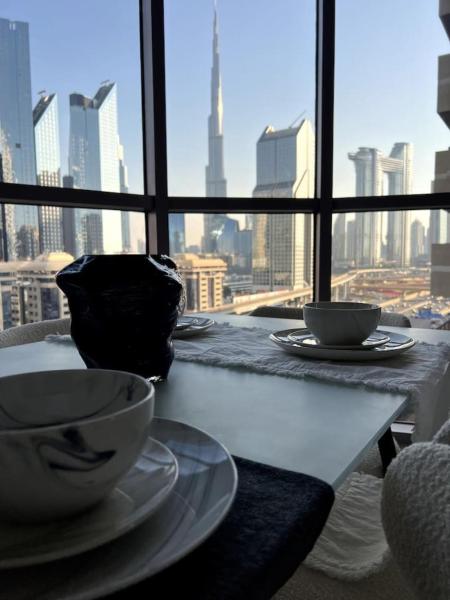A la foto es mostra l'objecte Amazing 1BR Full Burj View situat a la ciutat de Dubai.