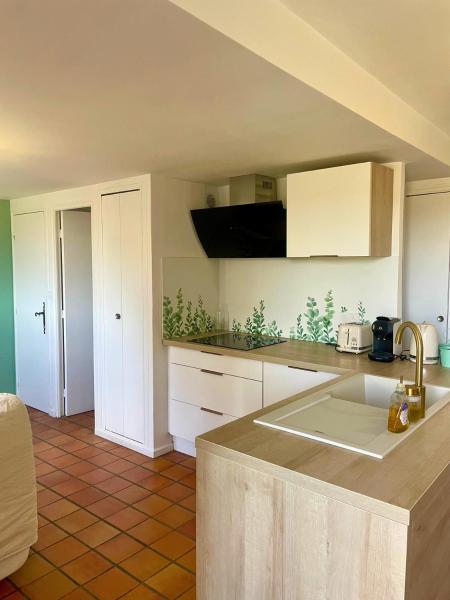 A la foto es mostra l'objecte Duplex provençal avec vue sur les vignes situat a la ciutat de Sablet.