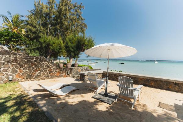 På bilden syns objektet Exceptional beachfront villa with lagoon view som ligger i staden Cap Malheureux.