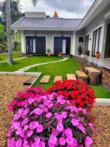 La photo montre l'objet Villa Pomerode Hospedagem - Suítes com conforto e aconchego conectados com a Natureza situé dans la ville de Pomerode.