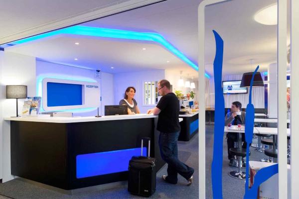 A la foto es mostra l'objecte Ibis Budget Montbéliard situat a la ciutat de Exincourt.