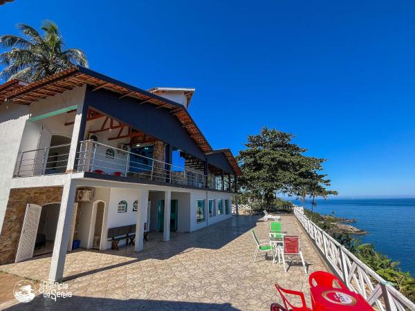 A la foto es mostra l'objecte Casa costeira com vista e área gourmet no Borrifos situat a la ciutat de Cambaquara.
