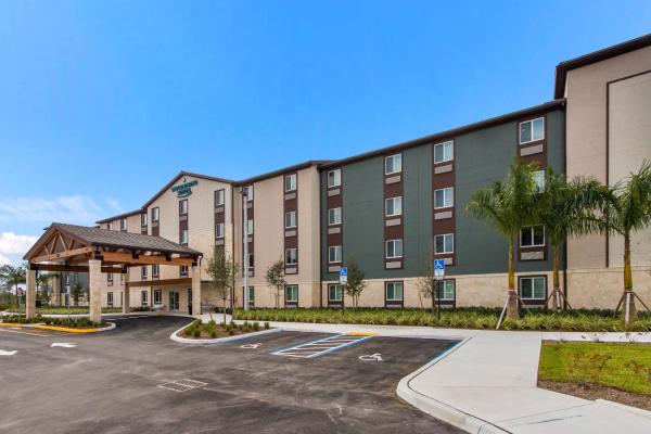 A la foto es mostra l'objecte WoodSpring Suites Tamarac situat a la ciutat de Tamarac.