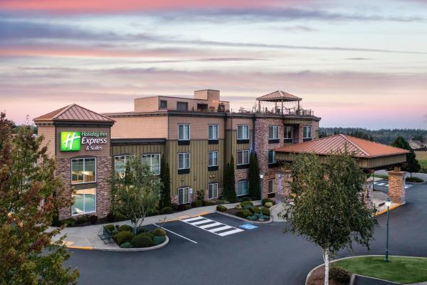 The photo shows the Holiday Inn Express Hotel & Suites North Sequim by IHG located in the city of Sequim.