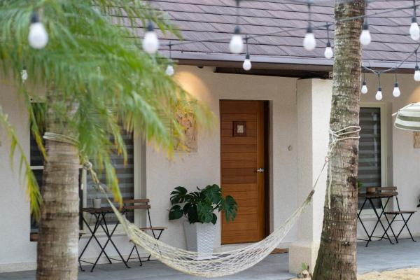 A la foto es mostra l'objecte Bali Slow Homestay situat a la ciutat de Shih-san-fen.