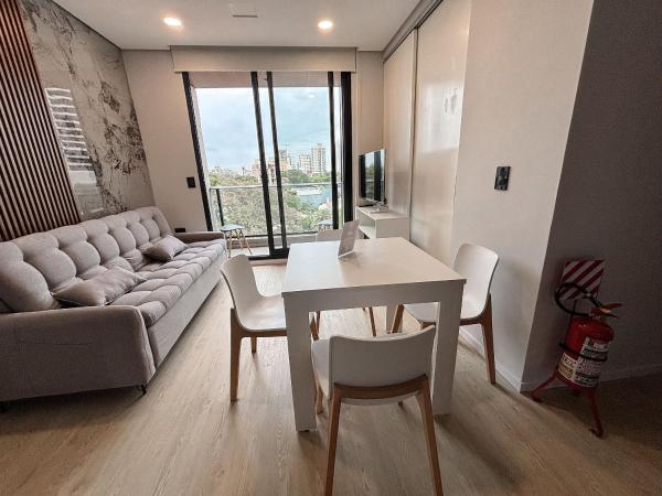 A la foto es mostra l'objecte Suite 1D • Eje financiero • Coworking y terraza situat a la ciutat de Asunción.