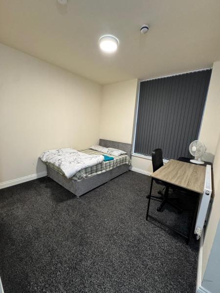 A la foto es mostra l'objecte Barnsley Guesthouse Couple Room Ground Floor situat a la ciutat de Staincross.