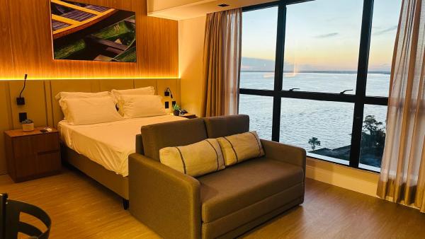Kuvassa näkyy kohde Flat com vista para o Rio N3gro no coração da Amazônia, joka sijaitsee kaupungissa Manaus.