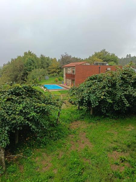 На фото показан объект Quinta do Fortunato-Casa dos Caseiros-Minho, Viana do Castelo, Meixedo-Turismo rural, расположенный в городе Montaria.