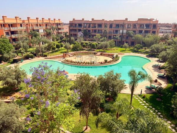Auf dem Foto ist das Objekt Chic Moroccan Vibes & Pool View - 2BR in der Stadt Marrakesch zu sehen.