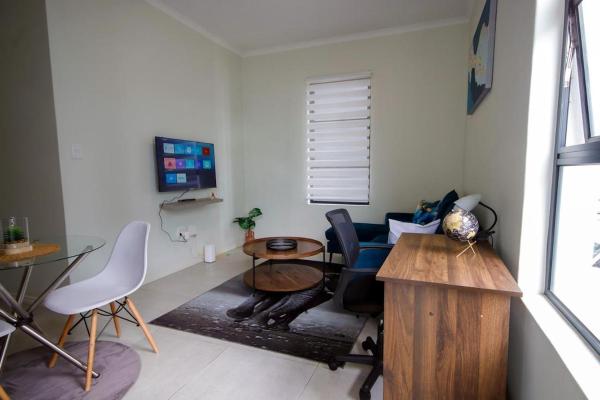 Na fotografii je vidět objekt PC Luxe Stays exquisite apartments nacházející se ve městě Erand.