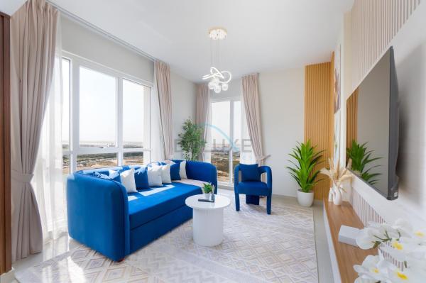 På billedet ses objektet Balcony Offering Captivating Lake Views 1BR, Just a Hop from the Golf Course, Lakeside B, Dubai Production City by Deluxe Holiday Homes beliggende i byen Dubai.
