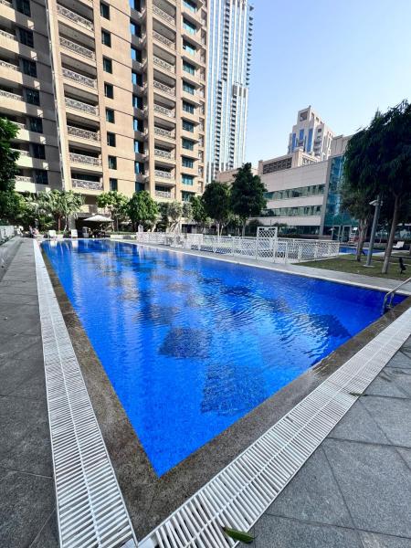 På billedet ses objektet Simply Comfort Vacation Homes Rental Chic Downtown Studio Few Steps to Burj Khalifa beliggende i byen Dubai.