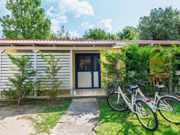 Na fotografii je vidět objekt Holiday Home Rosolina Mare Club-4 by Interhome nacházející se ve městě Rosolina Mare.