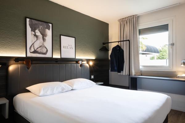A la foto es mostra l'objecte Tulip Inn Beaune situat a la ciutat de Beaune.