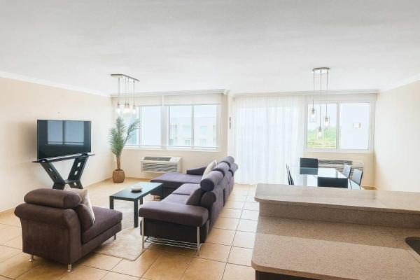 На фото показан объект Spacious 3BR Apt in Rio Grande, расположенный в городе Carmelita.