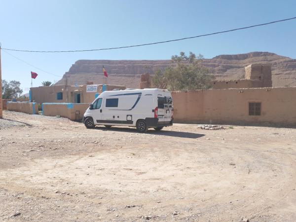 The photo shows the Gîte Palma Eagle Ziz Canyon located in the city of Gourrama.