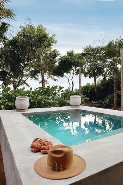 Na zdjęciu widoczny jest obiekt BT Homes - Tulum - Apartamentos modernos con elegancia y serenidad frente al mar położony w mieście Tulum.