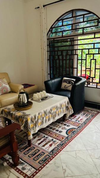 En la foto se muestra el objeto Amoy River Lodge ubicado en la ciudad de Moshi.